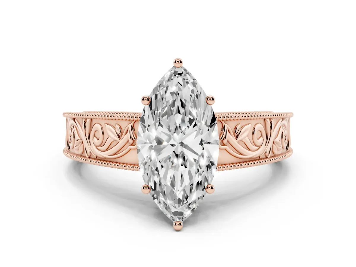 Marquise Cut Diamond Solitaire Ring with Engraved Band and Four-Prong Setting Rose gold