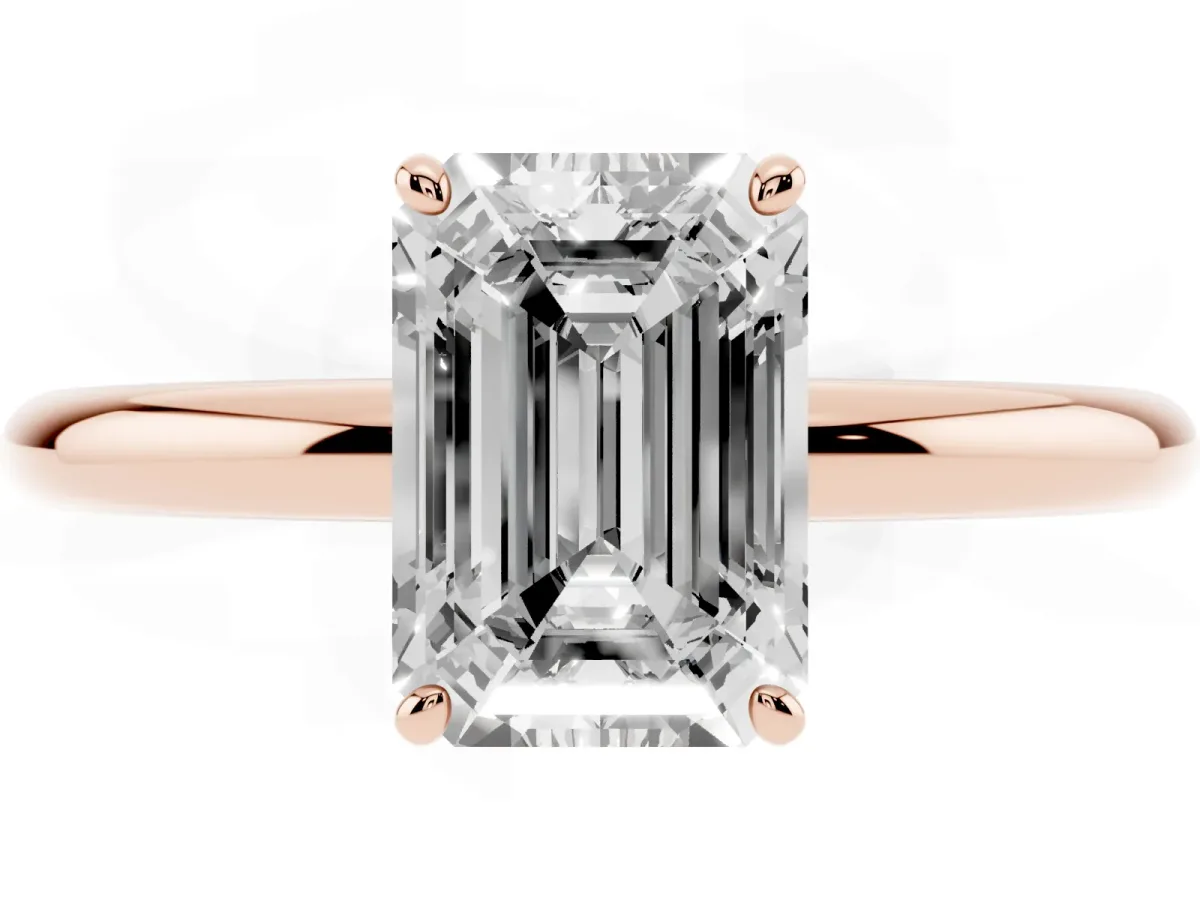 Emerald Cut Solitaire Diamond Ring with Four-Prong Setting on a Plain Band Rose gold