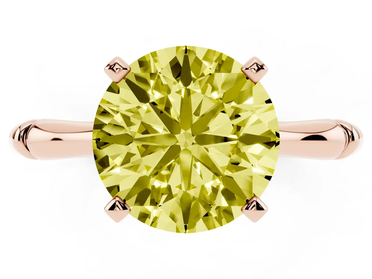 Fancy Yellow Round Cut Solitaire Diamond Ring with Bamboo Band and Four-Prong Setting Rose gold