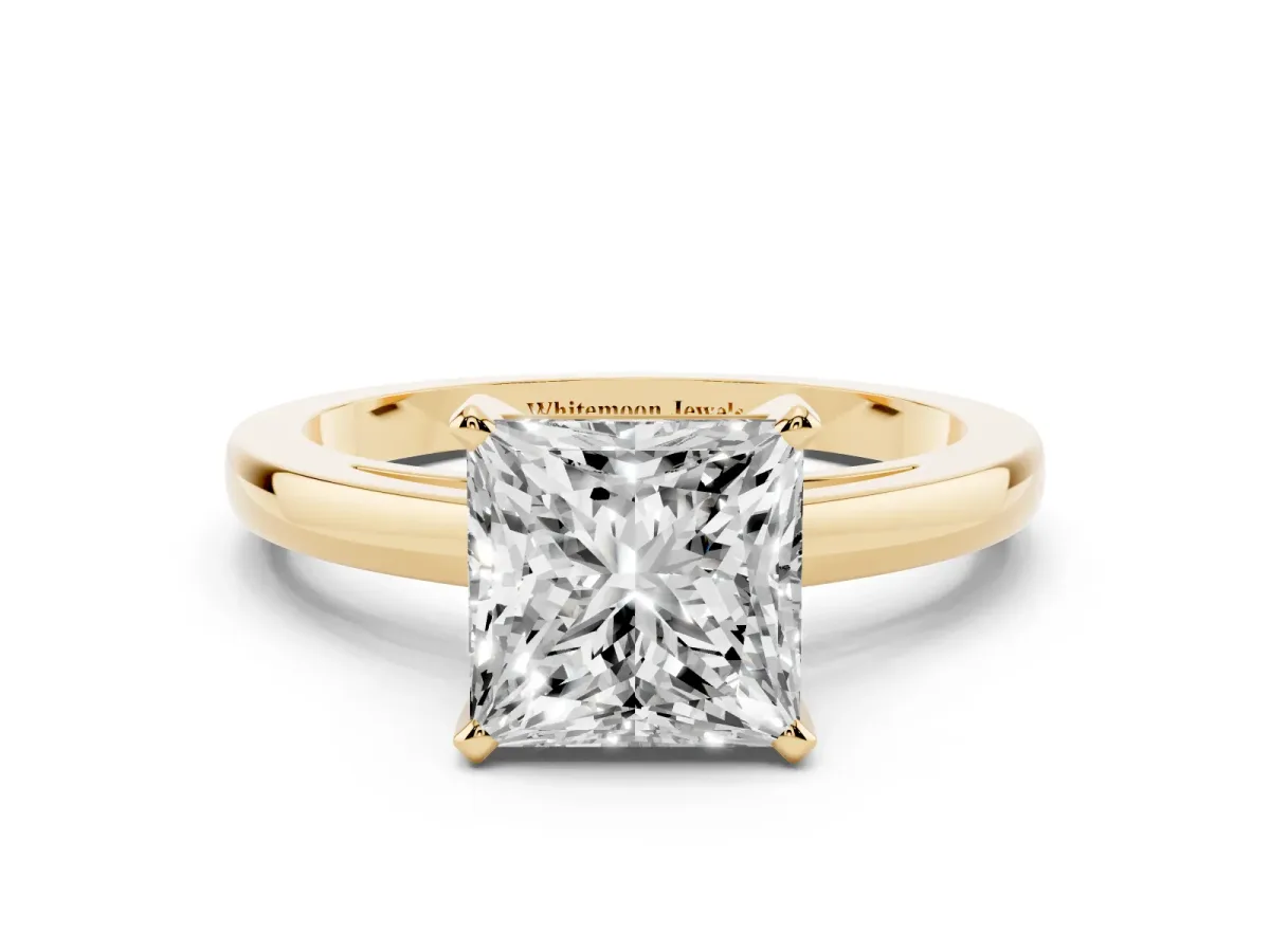 Princess Cut Solitaire Diamond Engagement Ring with Four-Prong Setting on a Classic Band Yellow gold