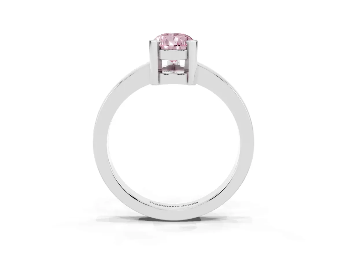 Fancy Pink Pear Cut Cut Solitaire Ring with Four-Prong Setting and Classic Band Silver