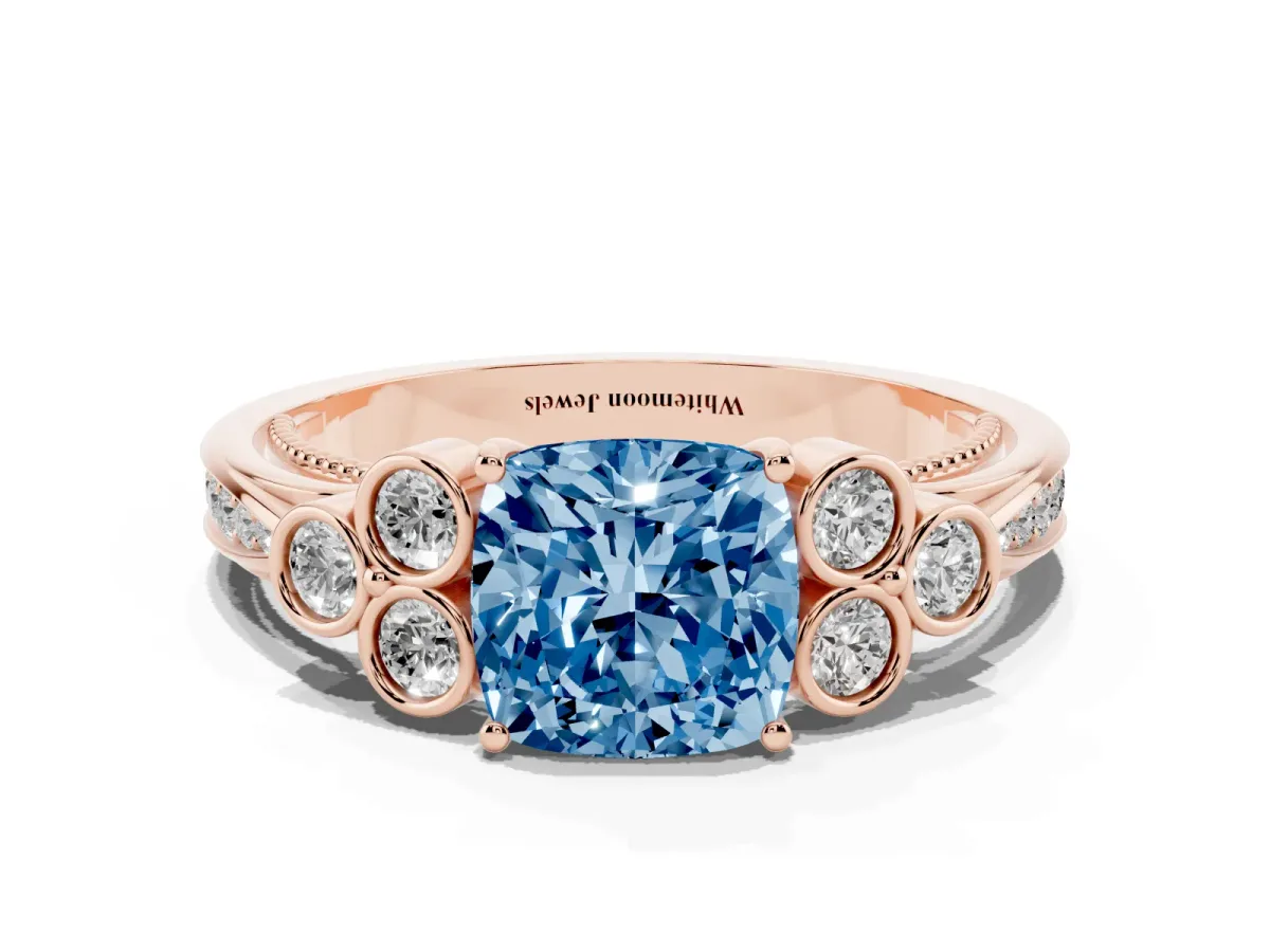 Fancy Blue Cushion Cut Cut Diamond Engagement Ring with Bezel Set Round Side Stones and Prong Setting Rose gold