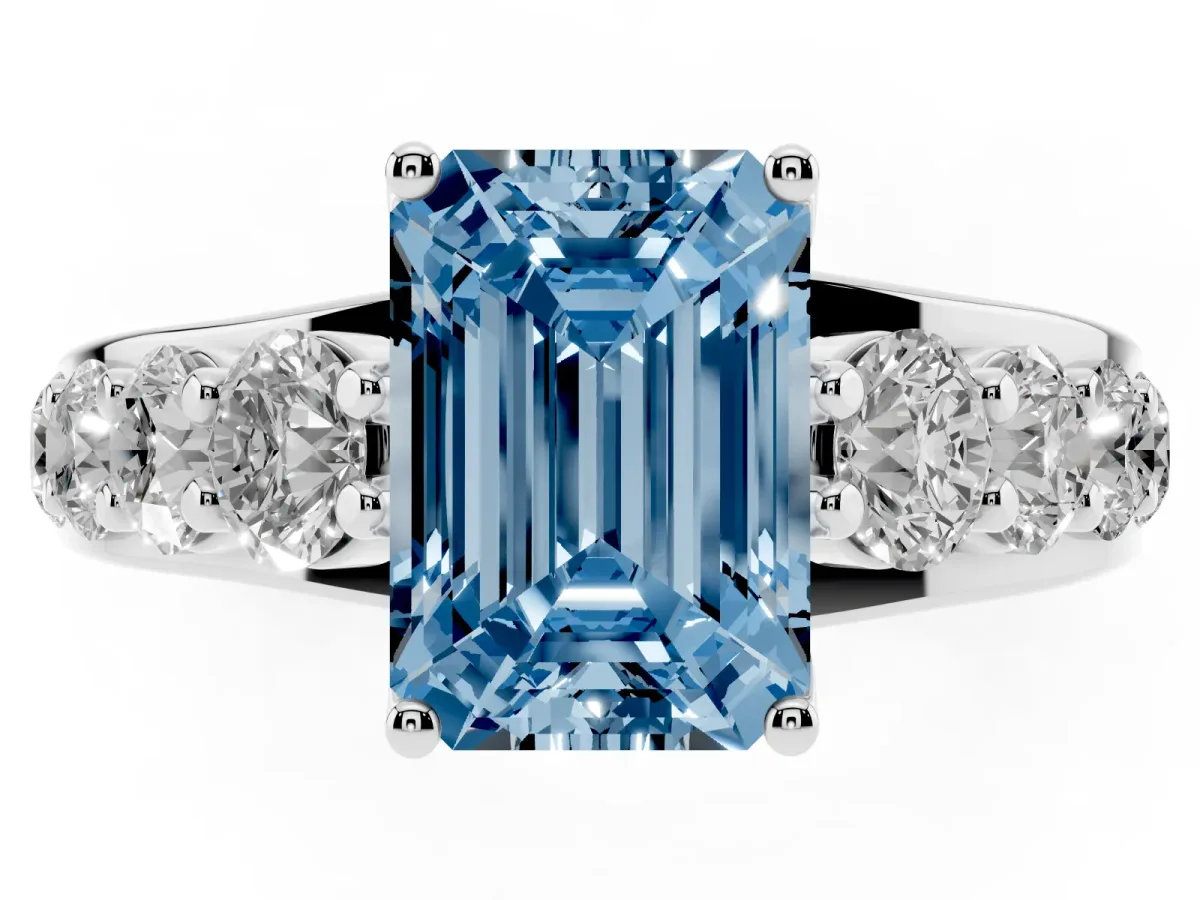 Fancy Blue Emerald Cut Diamond Engagement Ring with Pavé Band and Four-Prong Setting Silver