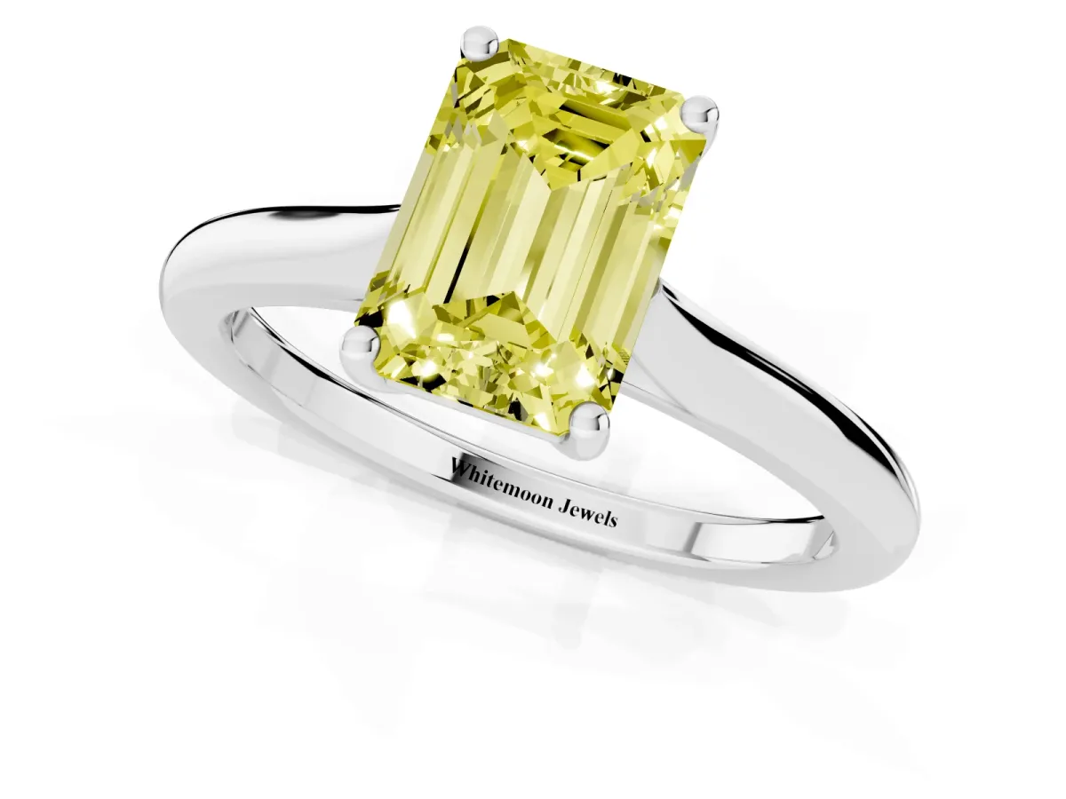 Fancy Yellow Emerald Cut Cut Solitaire Ring with Cathedral Band and Four-Prong Setting Silver