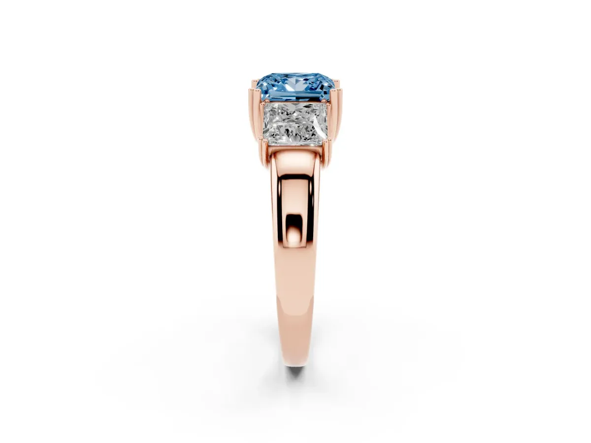 Fancy Blue Three-Stone Princess Cut Cut Diamond Ring with Channel Set Band and Four-Prong Setting Rose gold