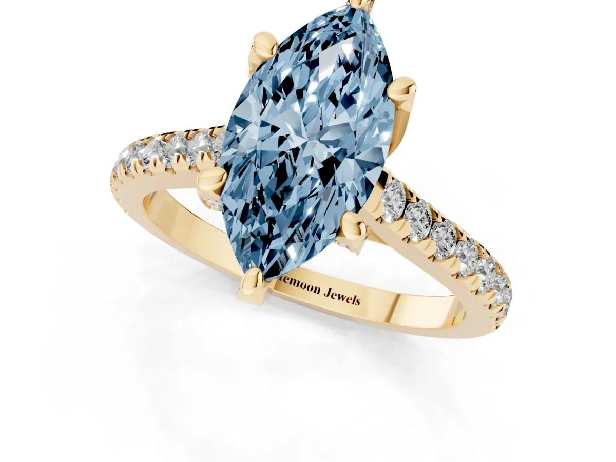 Fancy Blue Marquise Cut Brilliant Diamond Solitaire with Pavé Band and Four-Prong Setting Yellow gold