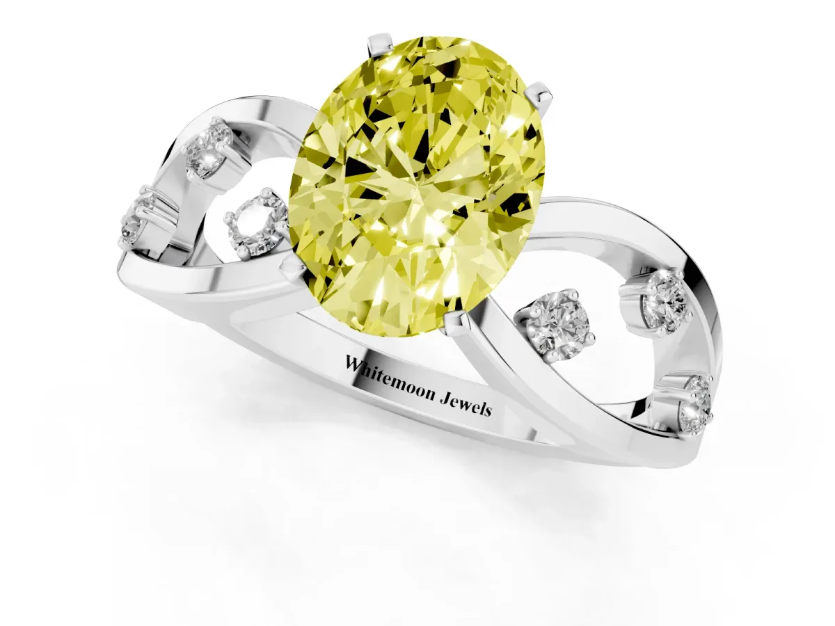 Fancy Yellow Oval Cut Cut Solitaire Diamond with Side Stones on Criss-Cross Band and Four-Prong Setting Silver