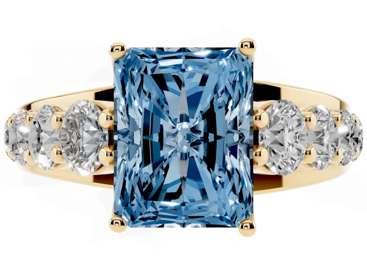Fancy Blue Radiant Cut Diamond Engagement Ring with Pavé Band and Four-Prong Setting Yellow gold