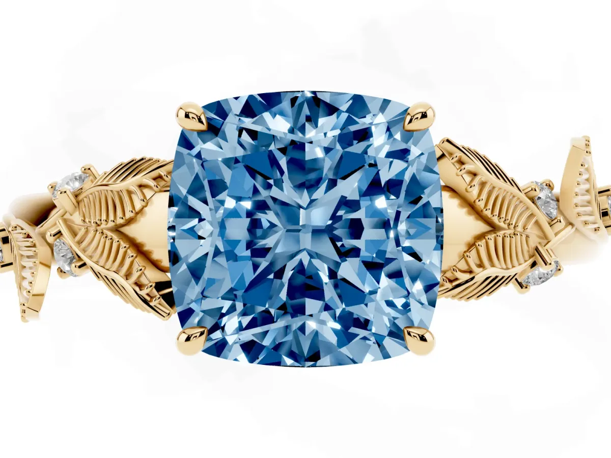 Fancy Blue Cushion Cut Diamond Solitaire Ring with Leaf Motif Band and Four-Prong Setting Yellow gold