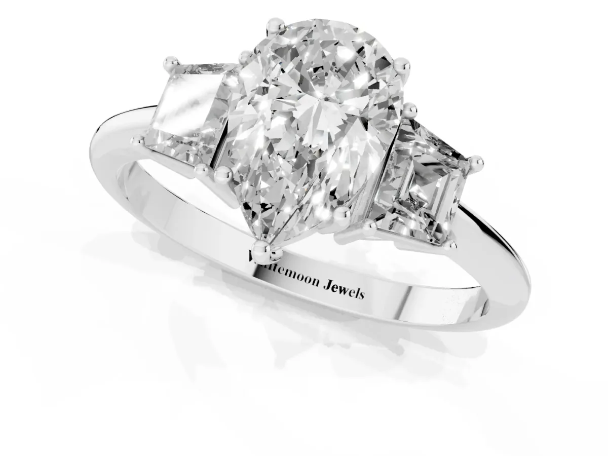 Pear Cut Diamond Three-Stone Ring with Trapezoid Side Stones and Prong Setting Platinum
