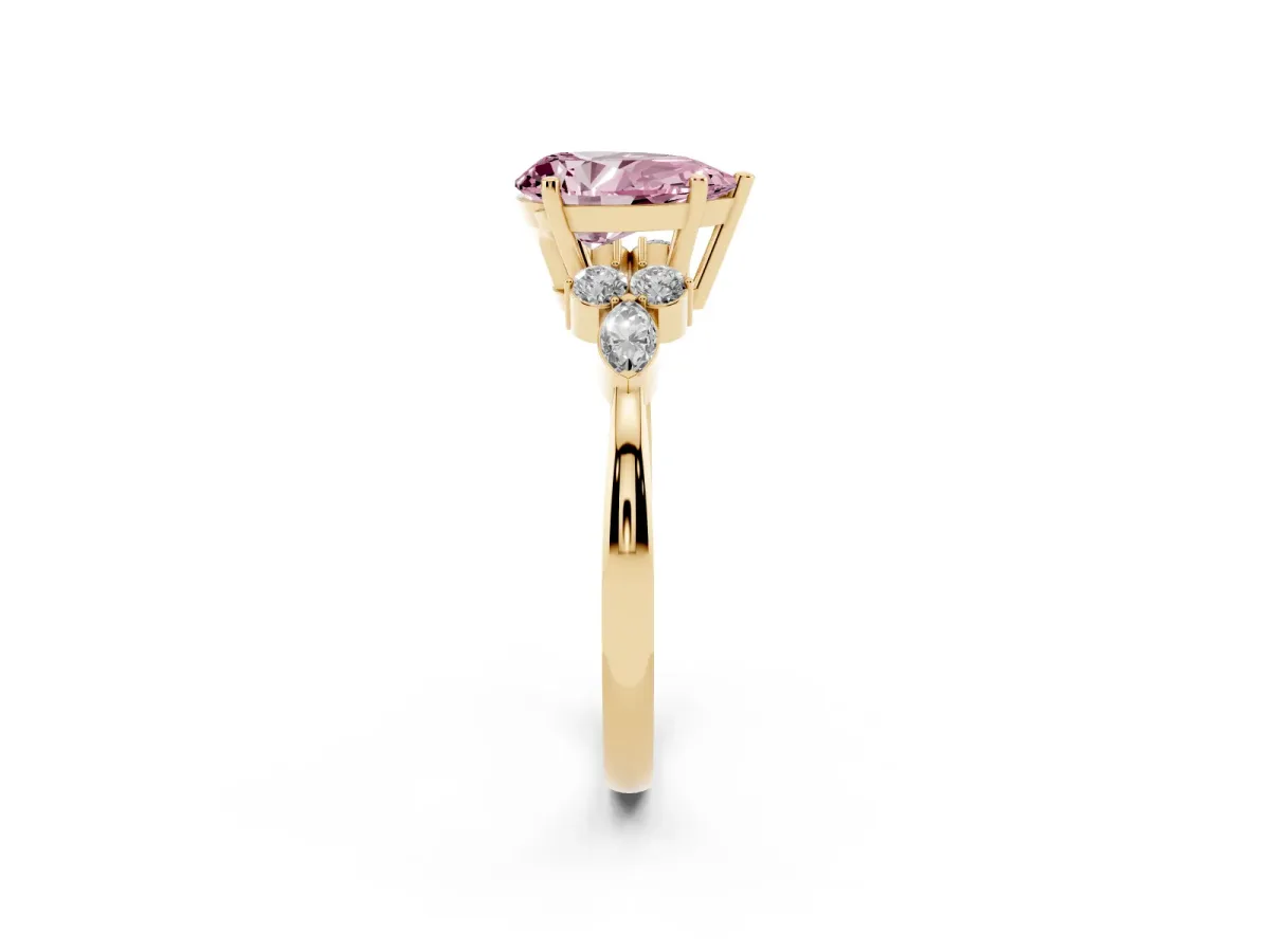 Fancy Pink Pear Cut Brilliant Diamond Solitaire Ring with Pear Side Stones and Four-Prong Setting Yellow gold