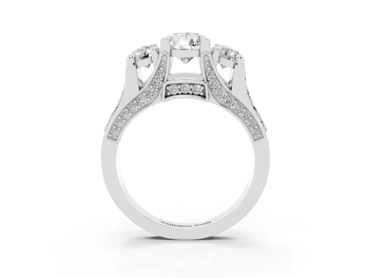 Pear Cut Diamond Three-Stone Ring with Channel Set Band and Four-Prong Setting Silver