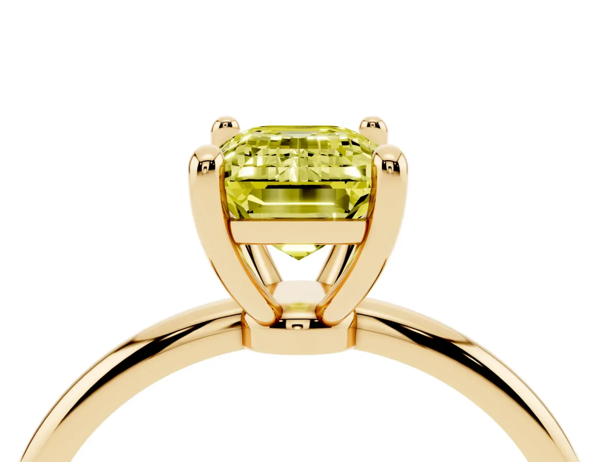 Fancy Yellow Emerald Cut Solitaire Diamond Ring with 4-Prong Setting on a Classic Band Yellow gold