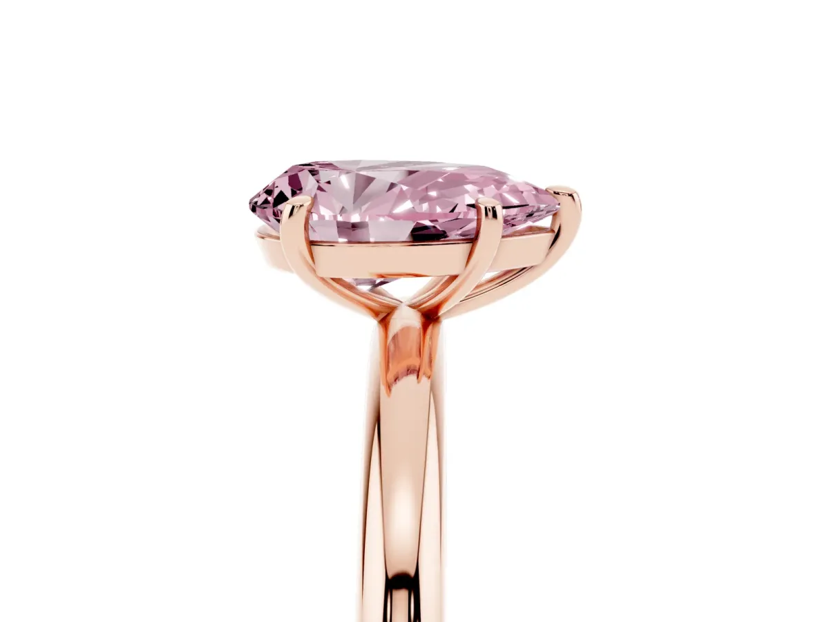 Fancy Pink Pear Cut Solitaire Diamond Ring with Four-Prong Setting on a Plain Band Rose gold