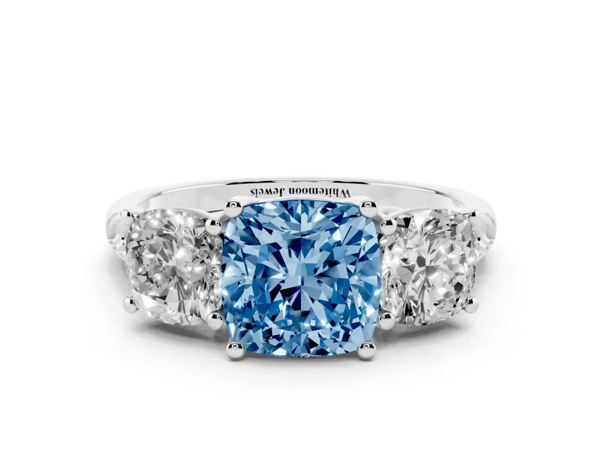 Fancy Blue Three-Stone Cushion Cut Diamond Ring with Round Pavé Band and Prong Setting Silver
