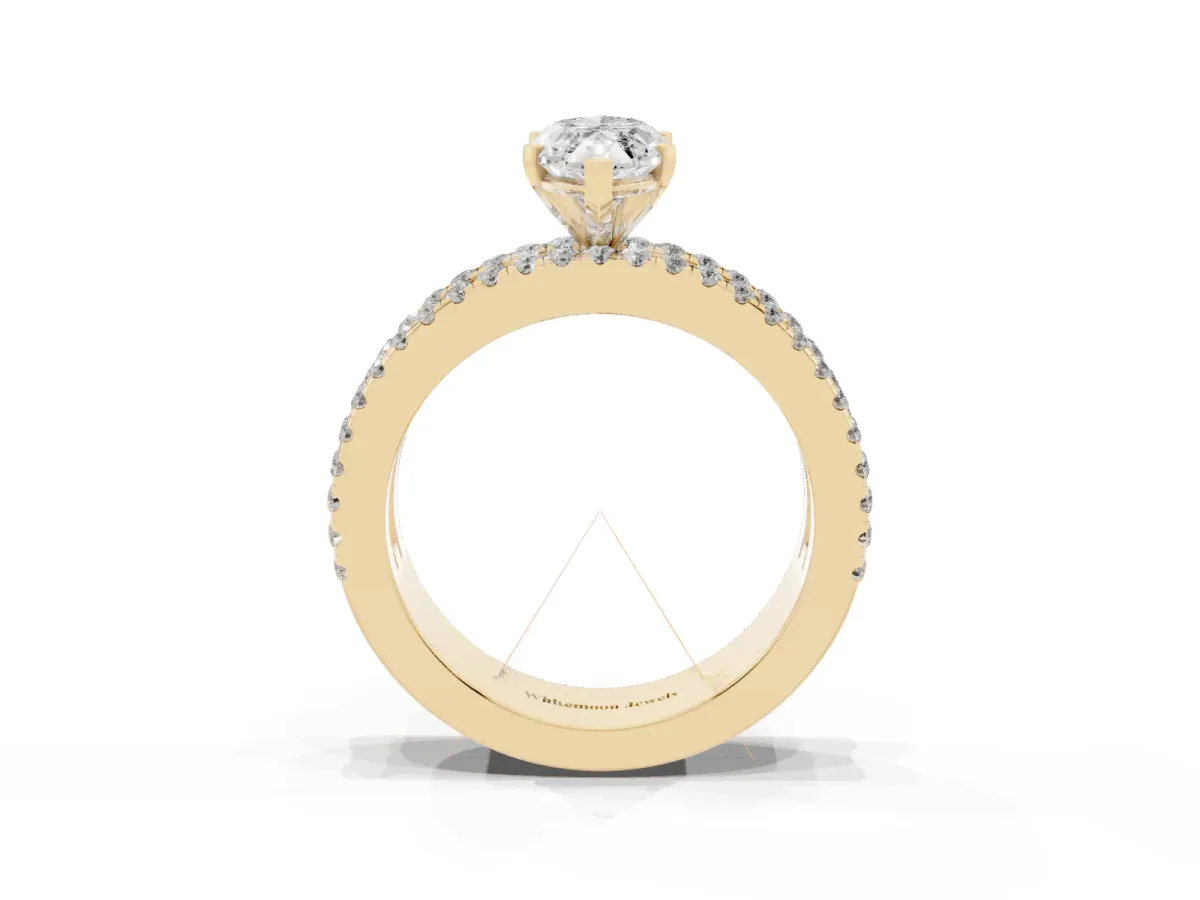 Marquise Cut Diamond Solitaire Ring with Pavé and Channel Set Band Yellow gold