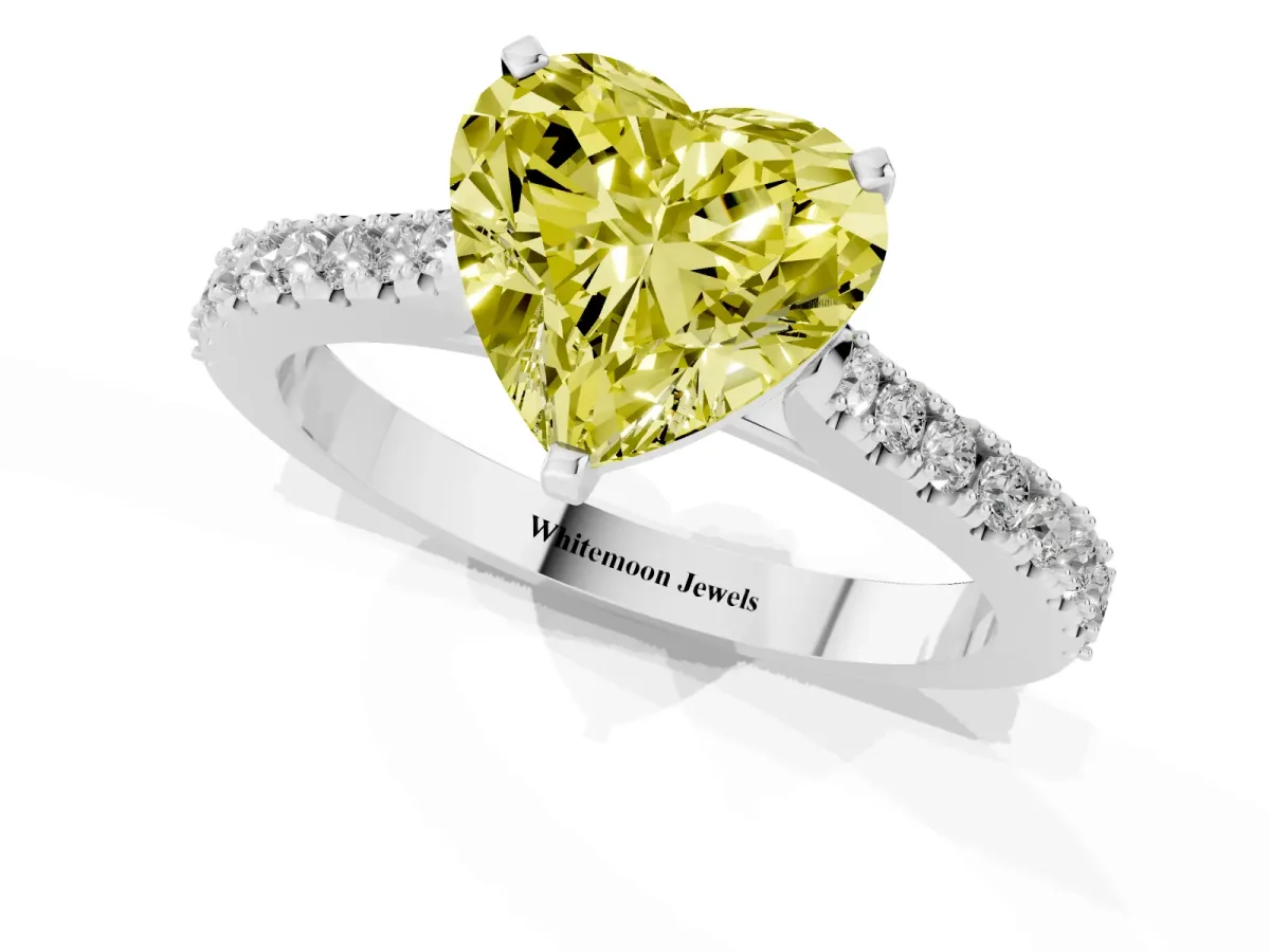 Fancy Yellow Heart Cut Cut Solitaire Diamond Engagement Ring with Pave Band and Four-Prong Setting Platinum