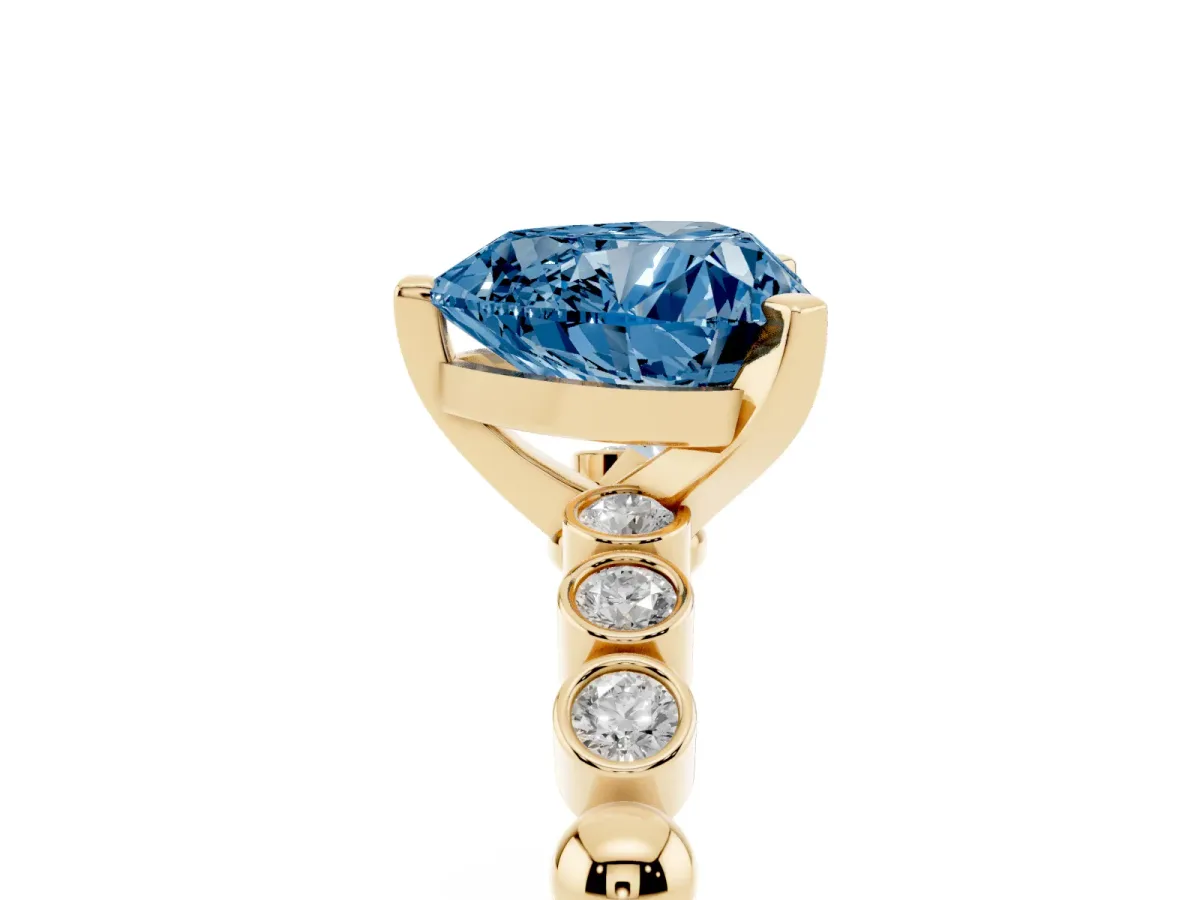 Fancy Blue Heart Cut Solitaire Bezel Accent Diamond Engagement Ring with Beaded Band and Four-Prong Setting Yellow gold