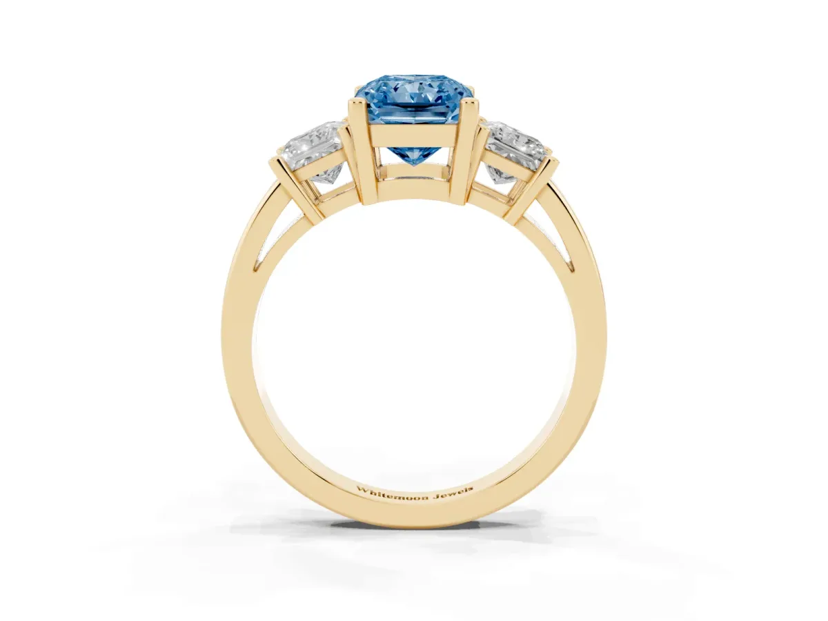 Fancy Blue Three-Stone Radiant Cut Cut Solitaire Ring with Prong Setting Yellow gold