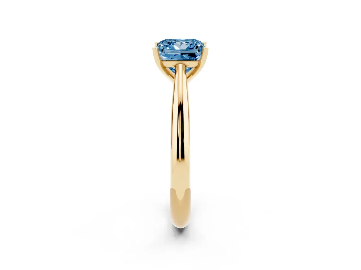 Fancy Blue Princess Cut Diamond Solitaire Engagement Ring with Cathedral Setting and Four-Prong Mount Yellow gold