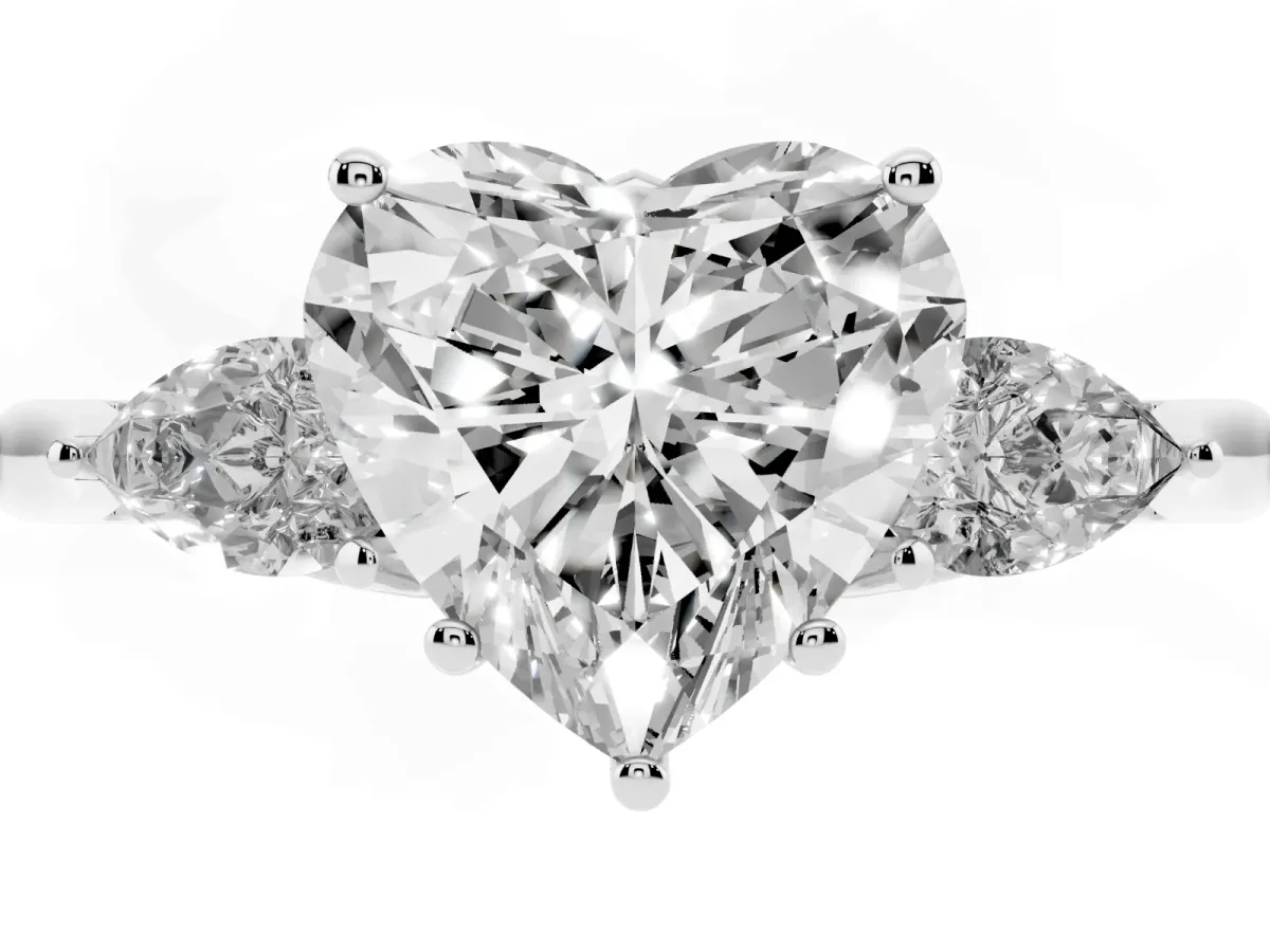 Three-Stone Heart Cut Brilliant Diamond Solitaire Ring with Tapered Band and Four-Prong Setting Silver