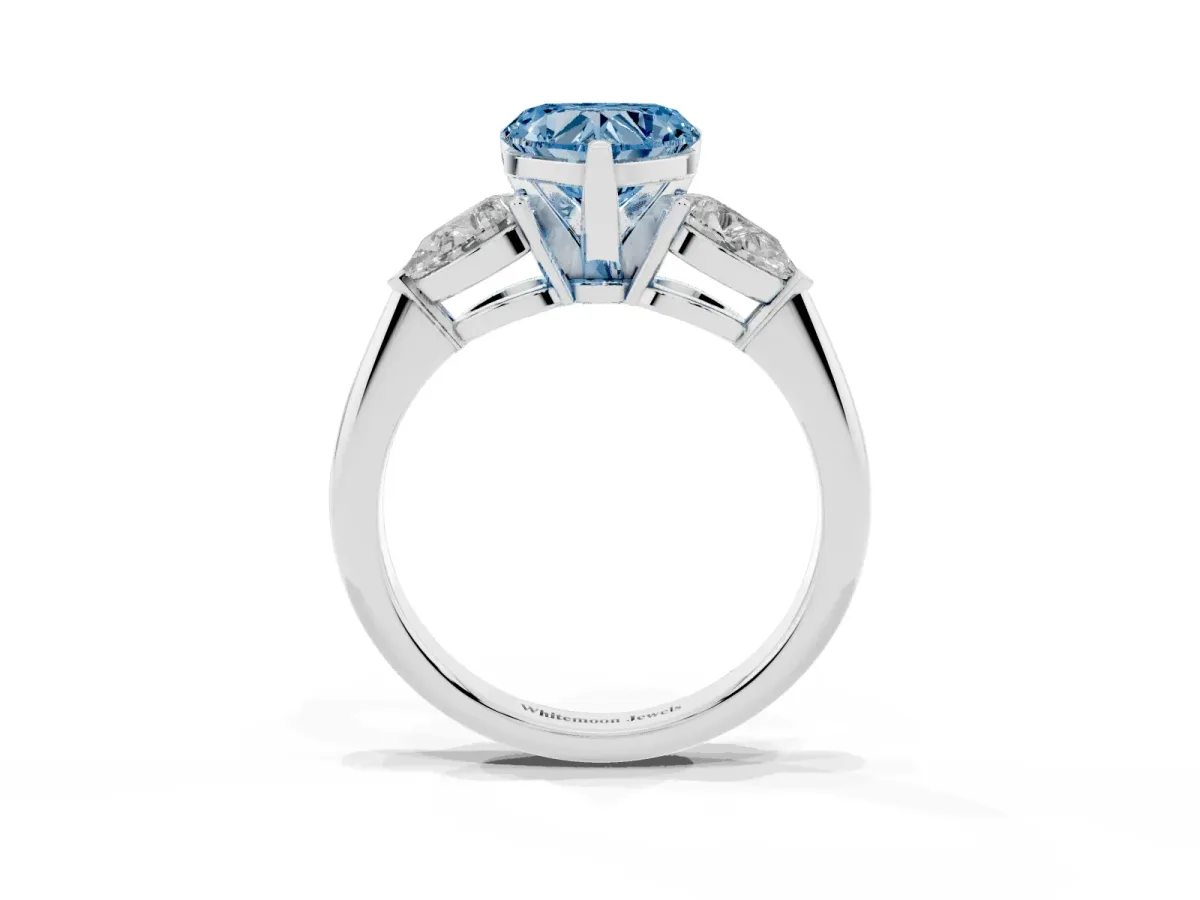 Fancy Blue Three-Stone Heart Cut Diamond Ring with Pear Side Stones and Four-Prong Setting Silver