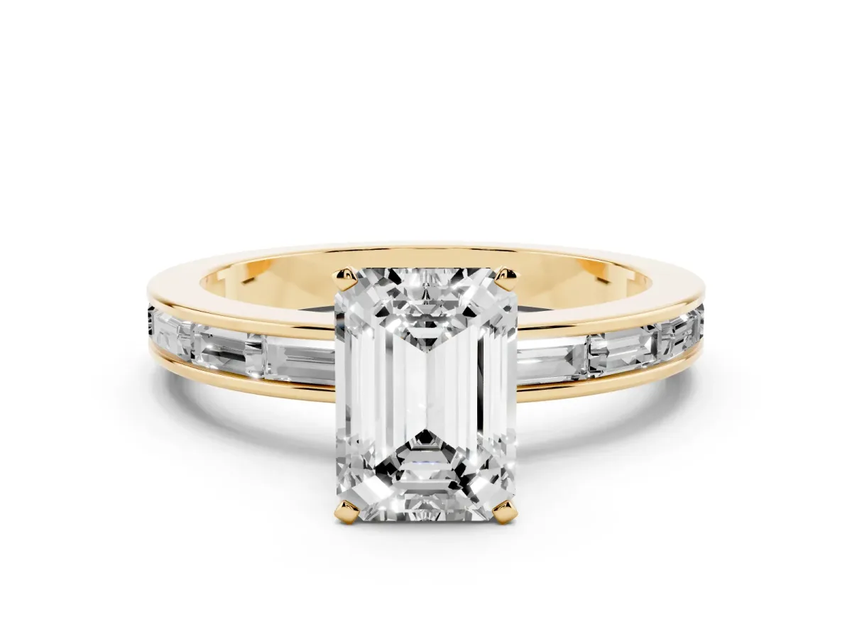 Emerald Cut Solitaire Diamond Ring with Channel-Set Baguette Band and Four-Prong Setting Yellow gold