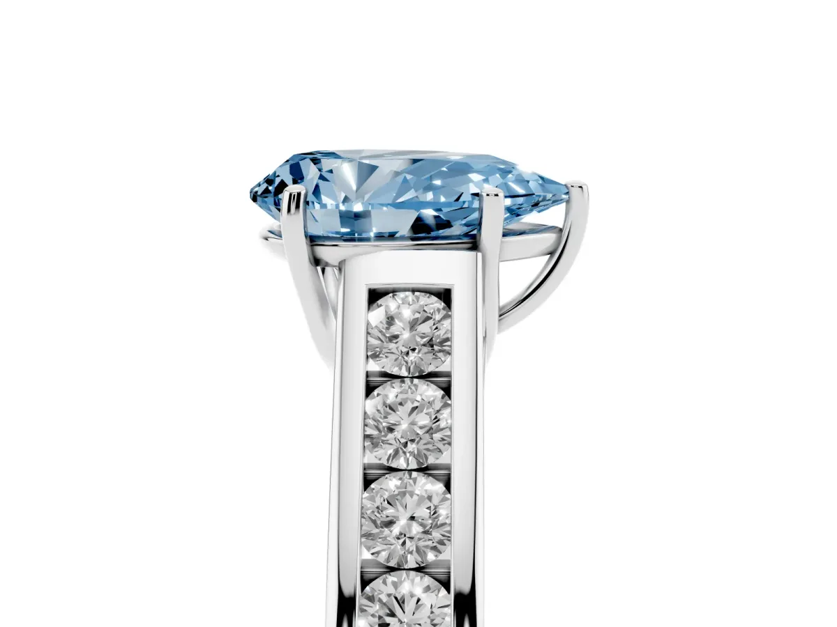 Fancy Blue Pear Cut Brilliant Channel-Set Solitaire Ring with Four-Prong Setting Silver