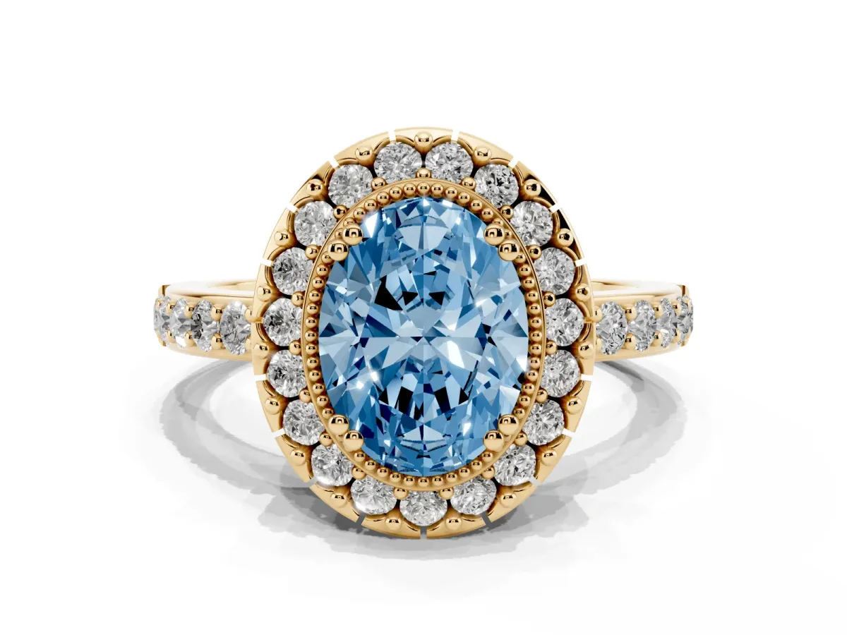 Fancy Blue Oval Cut Diamond Halo Ring with Pavé Band and Prong Setting Yellow gold