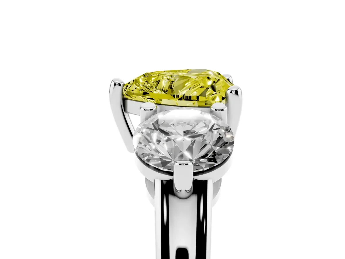 Fancy Yellow Three-Stone Heart Cut Brilliant Cut Solitaire Ring with Prong Setting on a Classic Band Silver