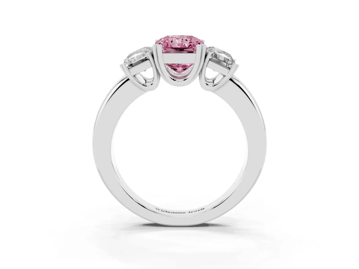 Fancy Pink Three-Stone Radiant Cut Cut Diamond Ring with Channel Set Band and Four-Prong Setting Platinum