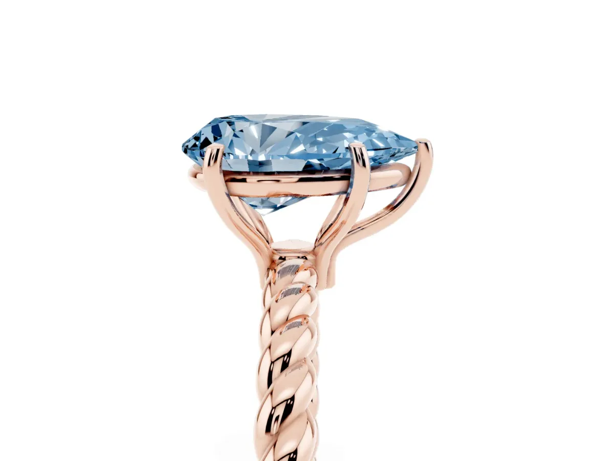 Fancy Blue Pear Cut Solitaire Twist Band Ring with Four-Prong Setting Rose gold