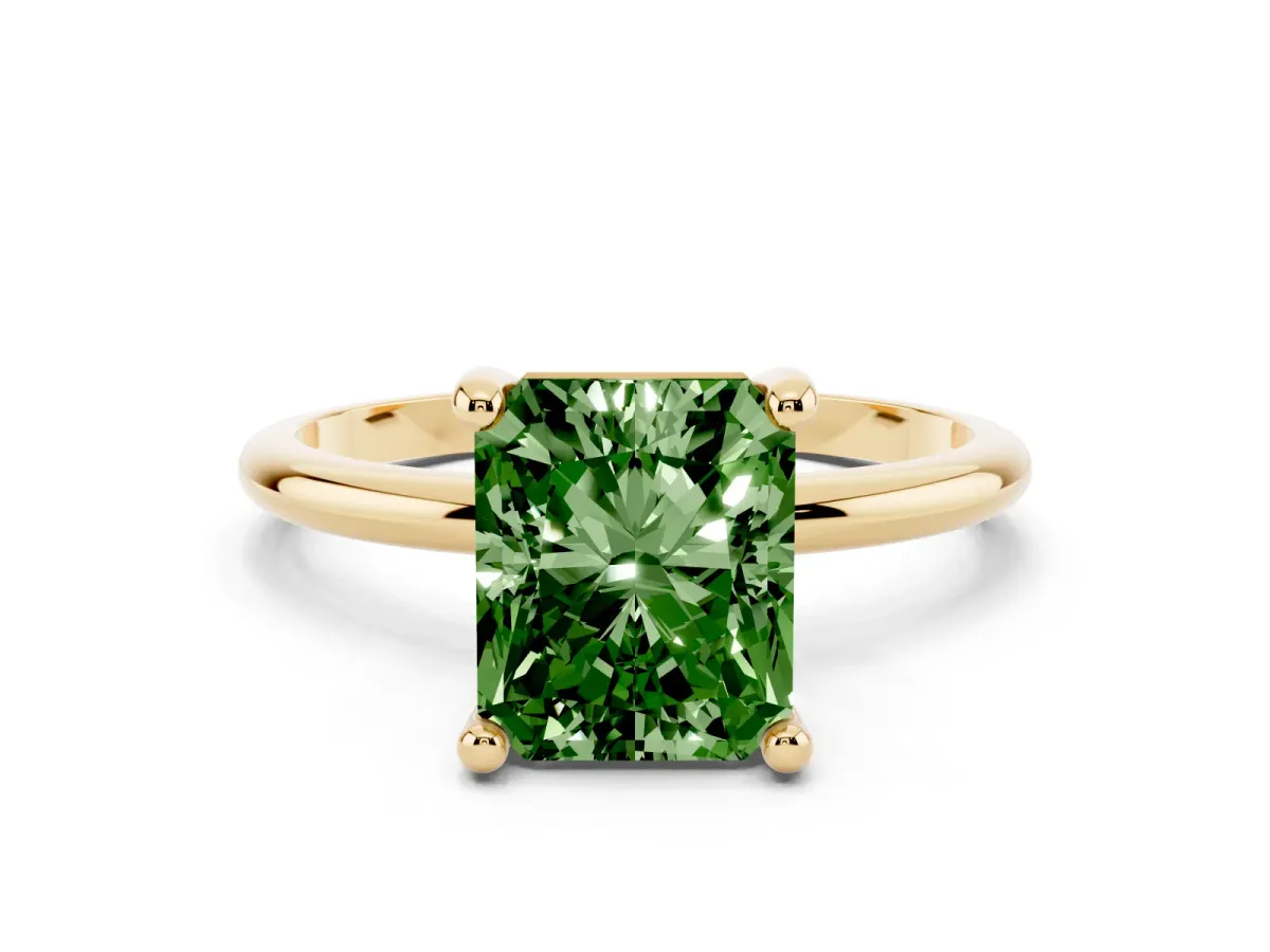 Fancy Green Radiant Cut Solitaire Diamond Ring with 4-Prong Setting on a Classic Band Yellow gold