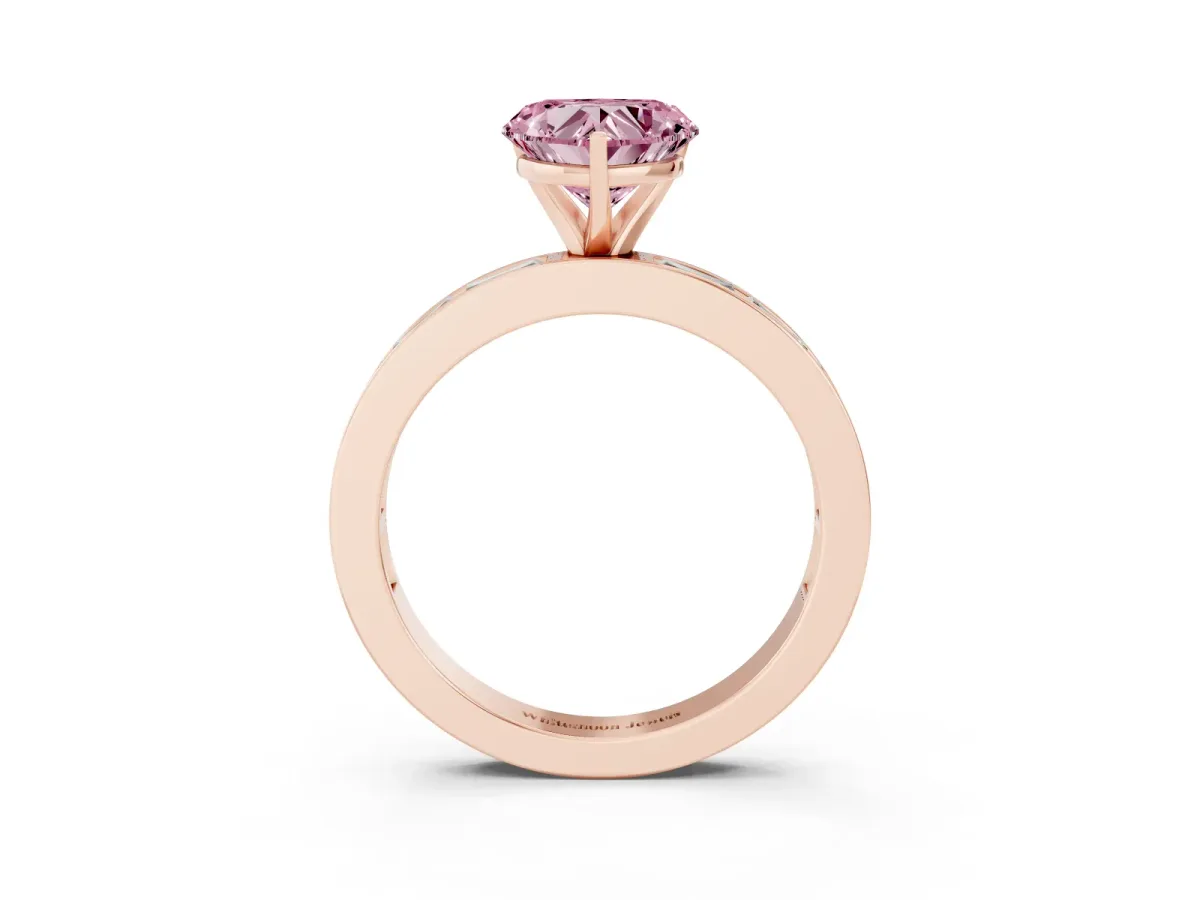 Fancy Pink Heart Cut Solitaire Diamond Ring with Channel-Set Baguette Band and Four-Prong Setting Rose gold