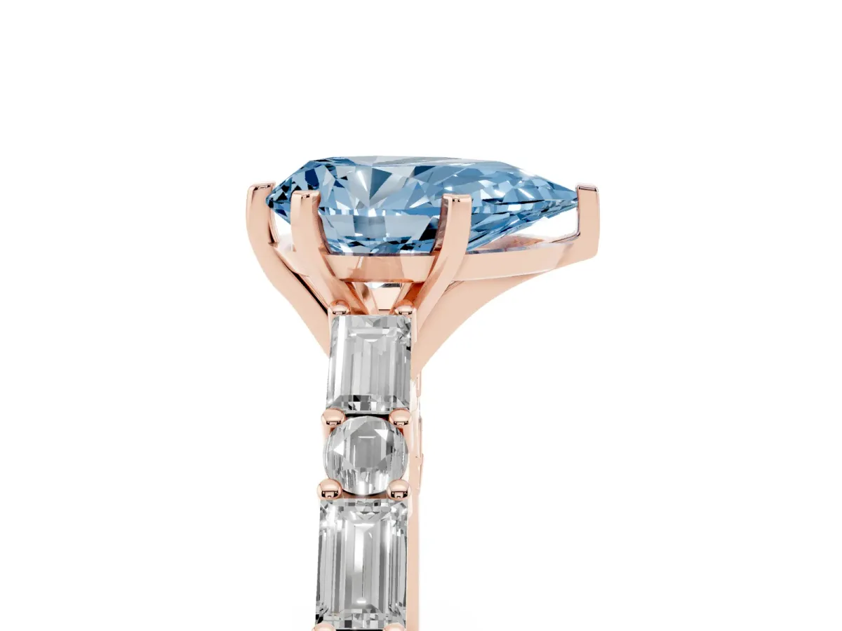 Fancy Blue Pear Cut Diamond Solitaire with Side Baguettes and Channel Set Band Rose gold