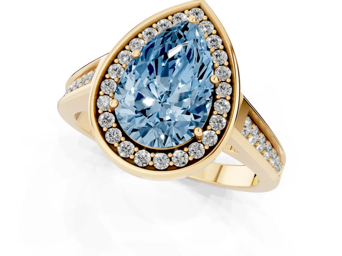 Fancy Blue Pear Cut Halo Solitaire Diamond Ring with Pave Band and Bezel Setting Yellow gold