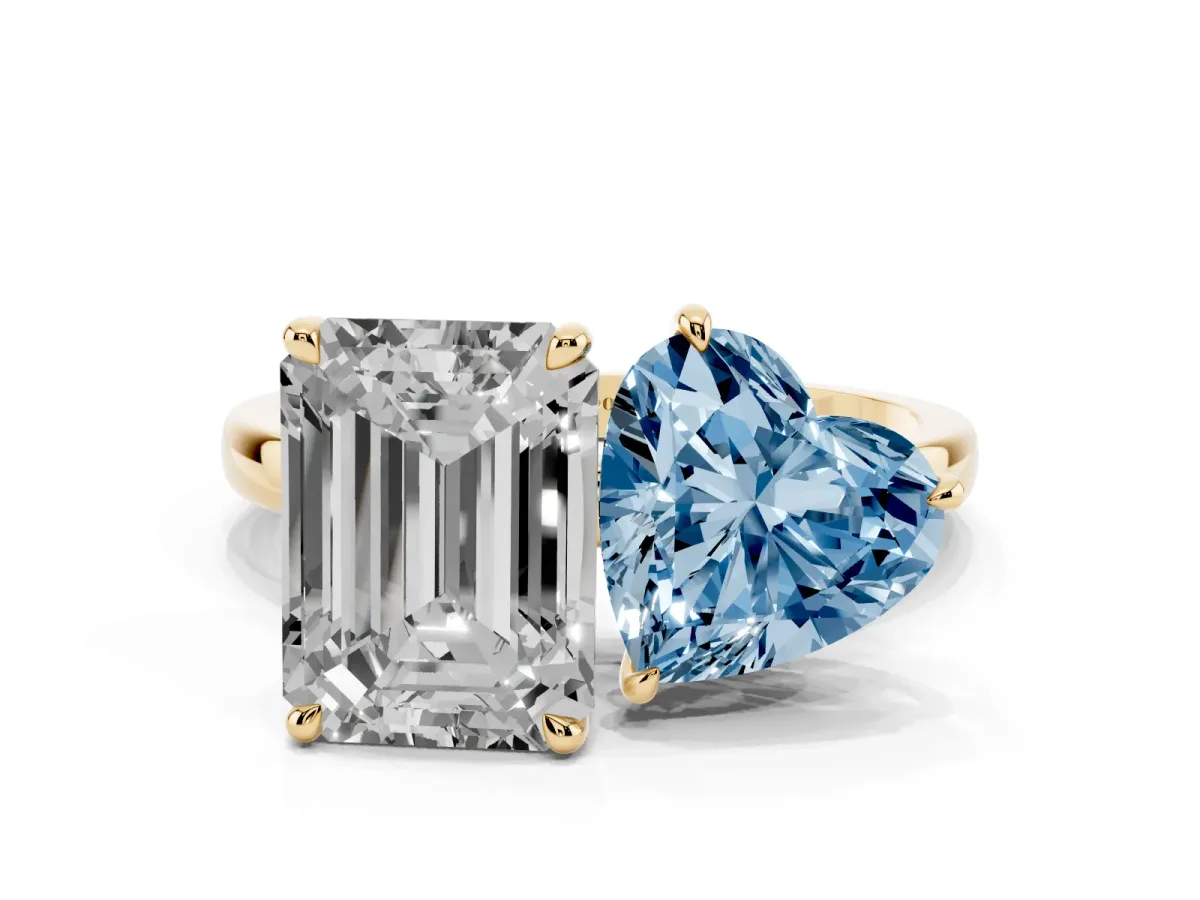 Fancy Blue Heart Cut and Emerald Cut Toi Moi Ring with Prong Setting Yellow gold