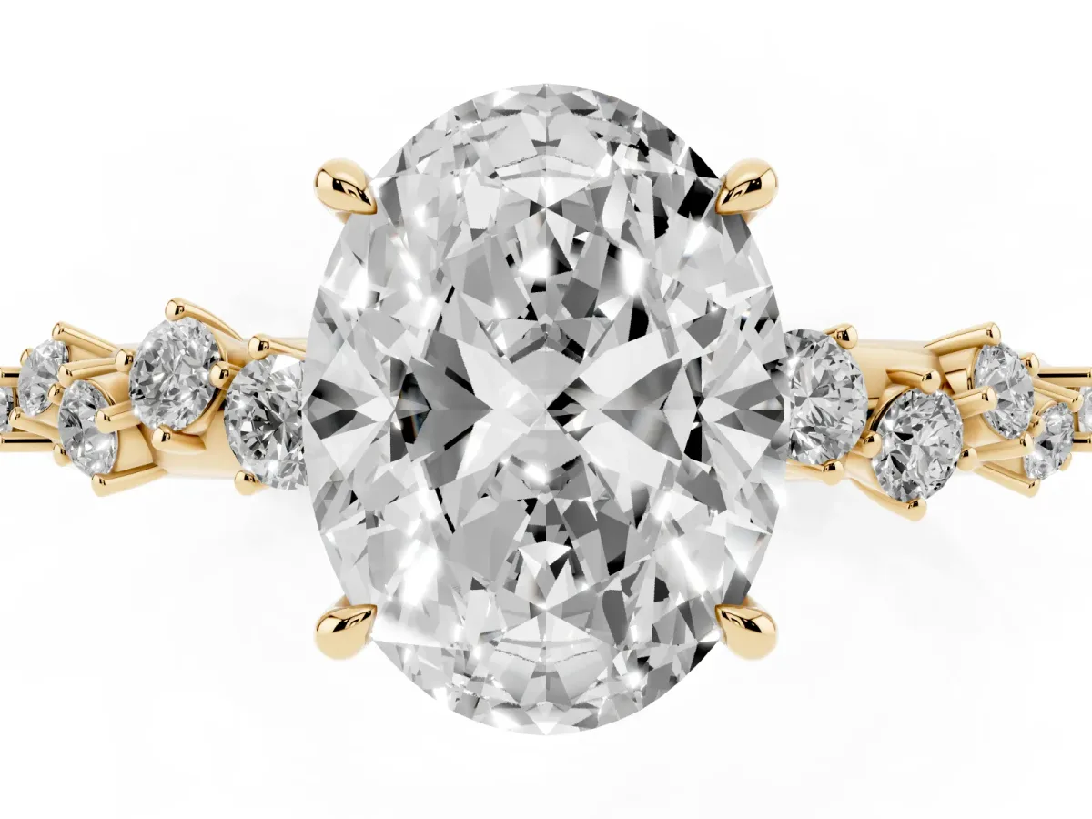 Oval Cut Diamond Cluster Side Stone Solitaire Ring with Prong Setting Yellow gold