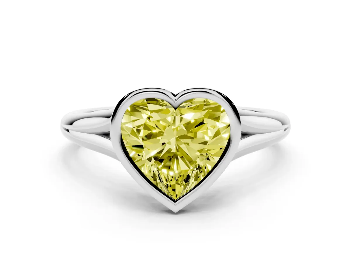 Fancy Yellow Bezel Set Heart Cut Cut Solitaire Ring with Tapered Band White gold