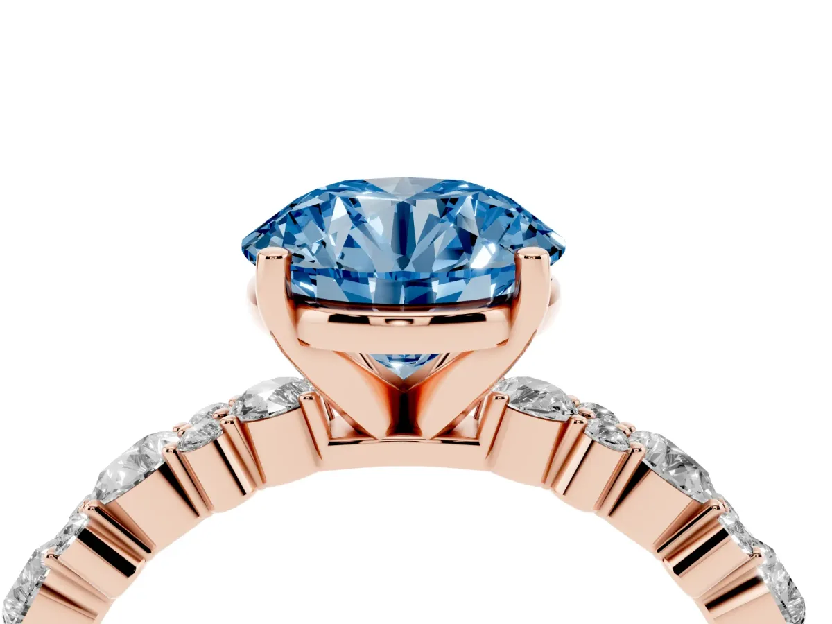 Fancy Blue Round Cut Diamond Side Stone Solitaire Ring with Round and Four-Prong Setting Rose gold