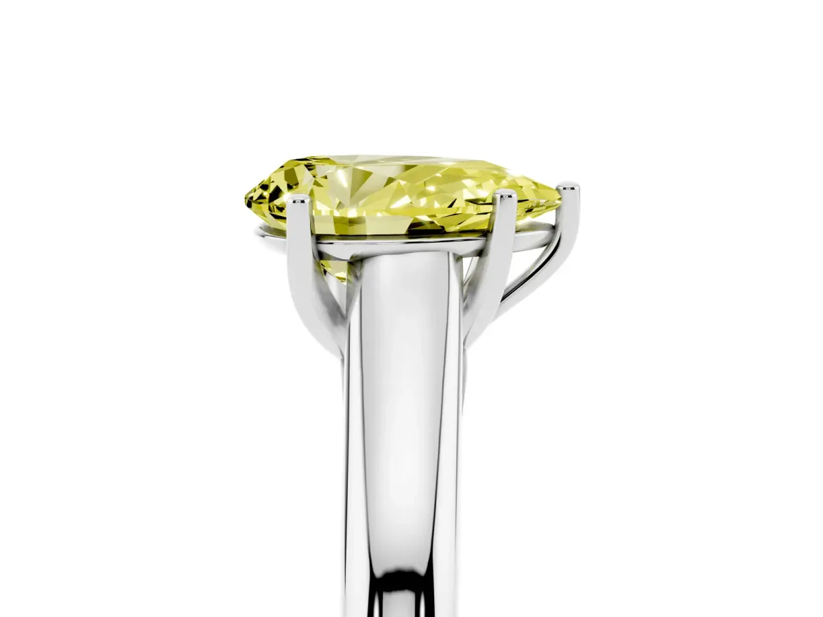 Fancy Yellow Pear Cut Solitaire Engagement Ring with Tapered Band and Four-Prong Setting Silver