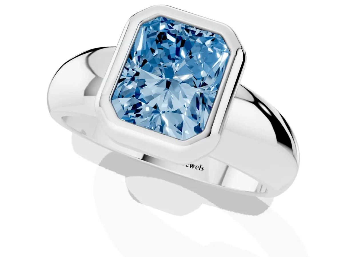 Fancy Blue Bezel Set Radiant Cut Solitaire Ring with Wide Band Silver