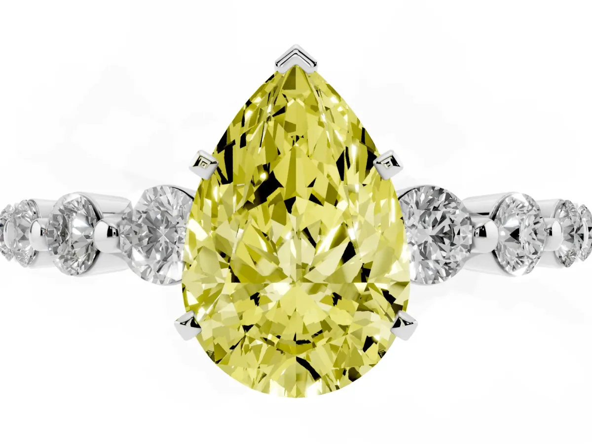 Fancy Yellow Pear Cut Solitaire Diamond Ring with Pave Band and Four-Prong Setting Silver