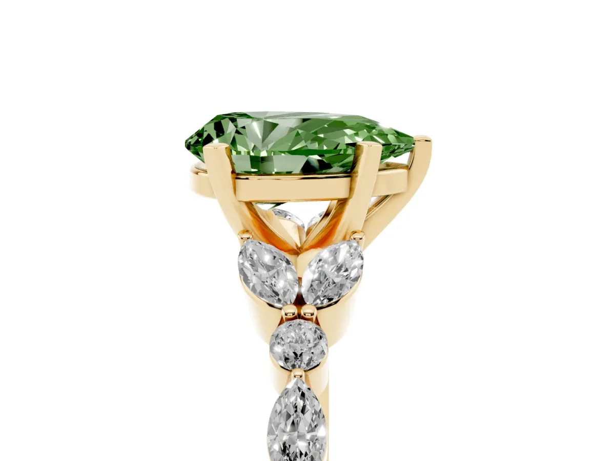 Fancy Green Pear Cut Diamond Solitaire Ring with Side Stones and Four-Prong Setting Yellow gold