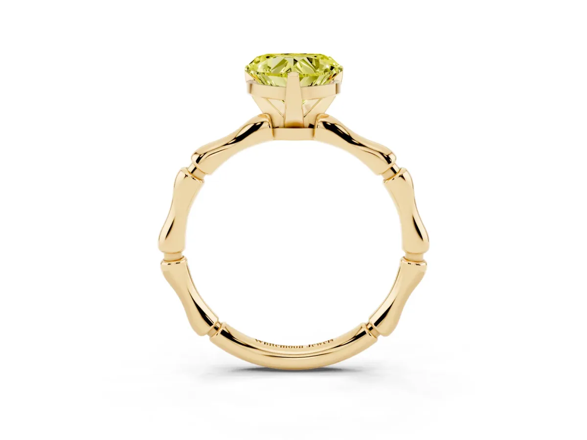 Fancy Yellow Heart Cut Solitaire Diamond Ring with Bamboo Band and Four-Prong Setting Yellow gold