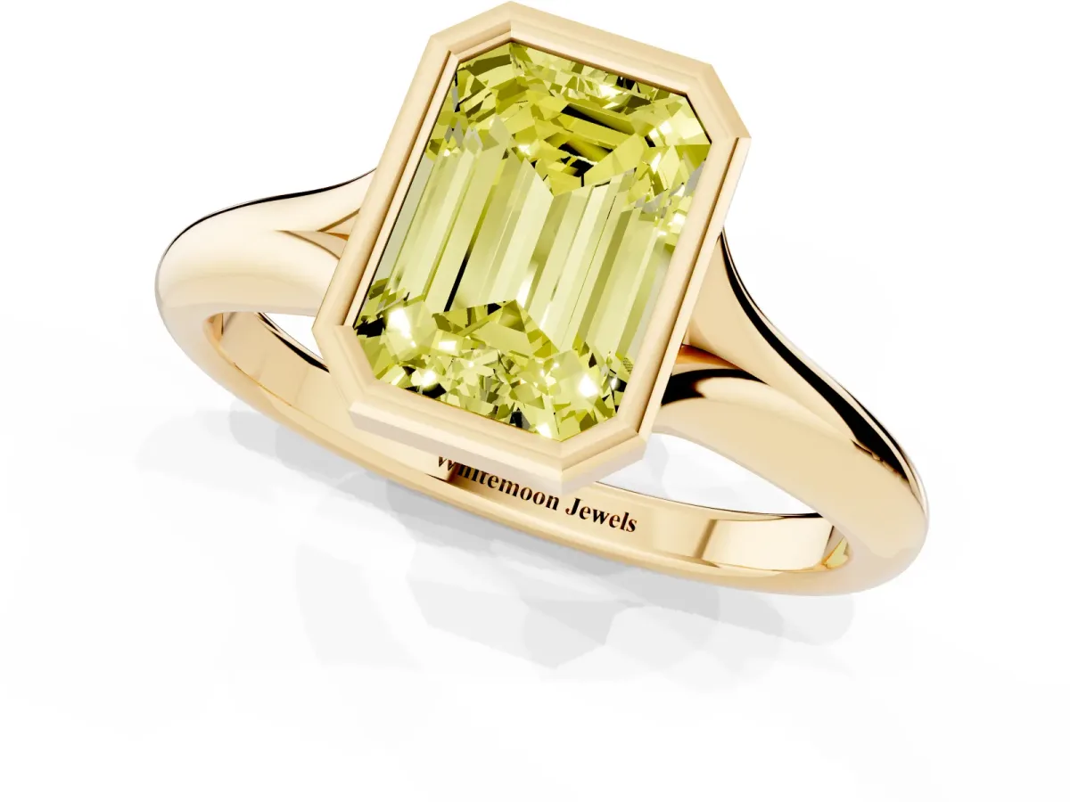 Fancy Yellow Bezel Set Emerald Cut Solitaire Diamond Ring with Smooth Band Yellow gold