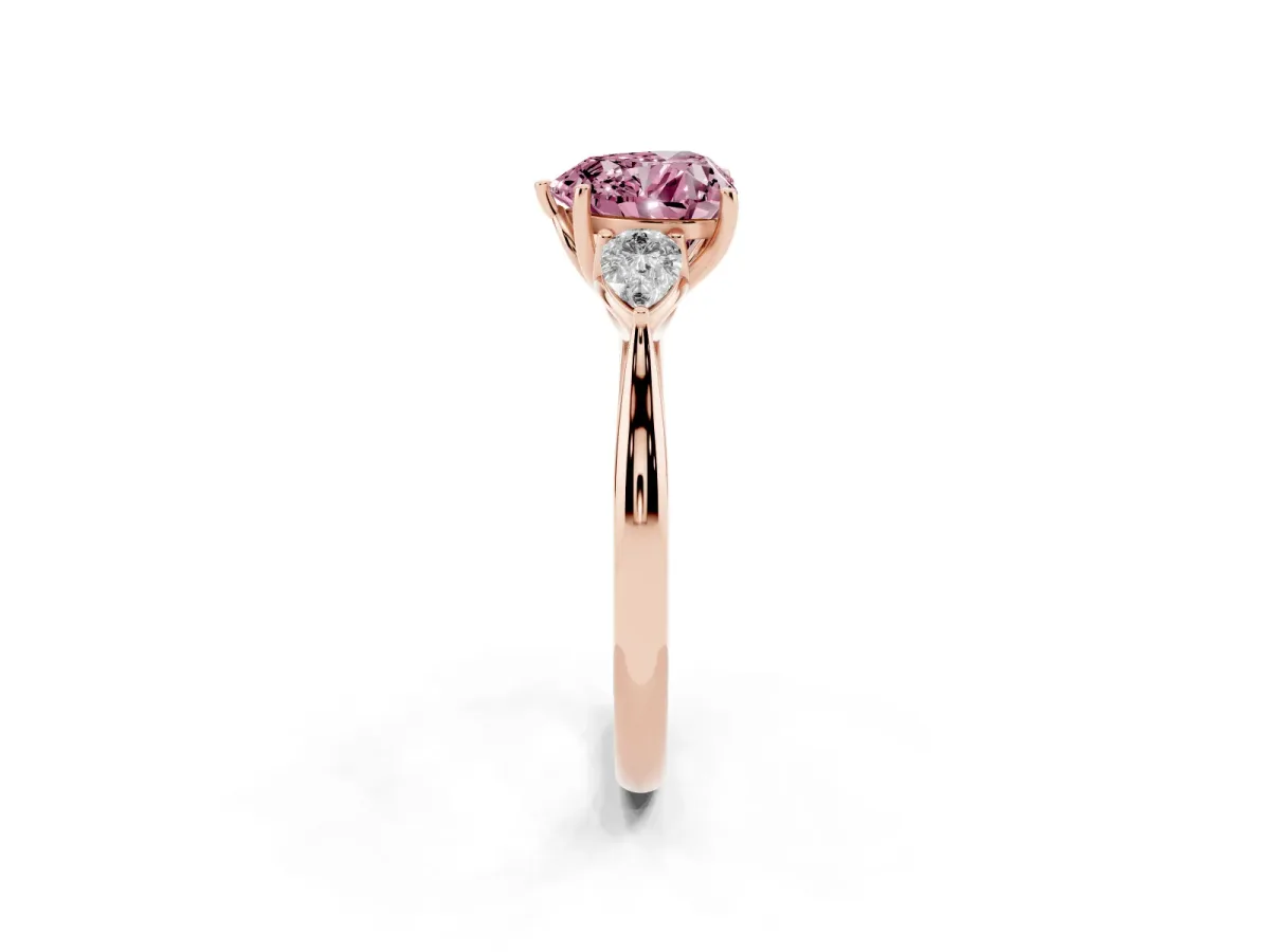 Fancy Pink Heart Cut Diamond Three-Stone Ring with Pear Side Stones and Prong Setting Rose gold