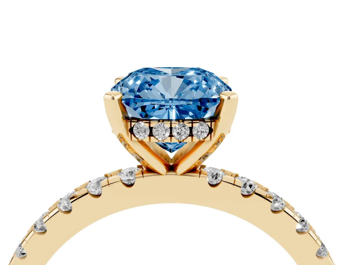 Fancy Blue Cushion Cut Diamond Solitaire Ring with Round Pavé Band and Four-Prong Setting Yellow gold