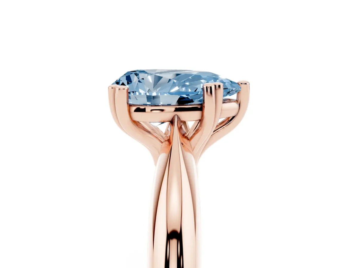Fancy Blue Pear Cut Cut Solitaire Engagement Ring with Tapered Band and Four-Prong Setting Rose gold
