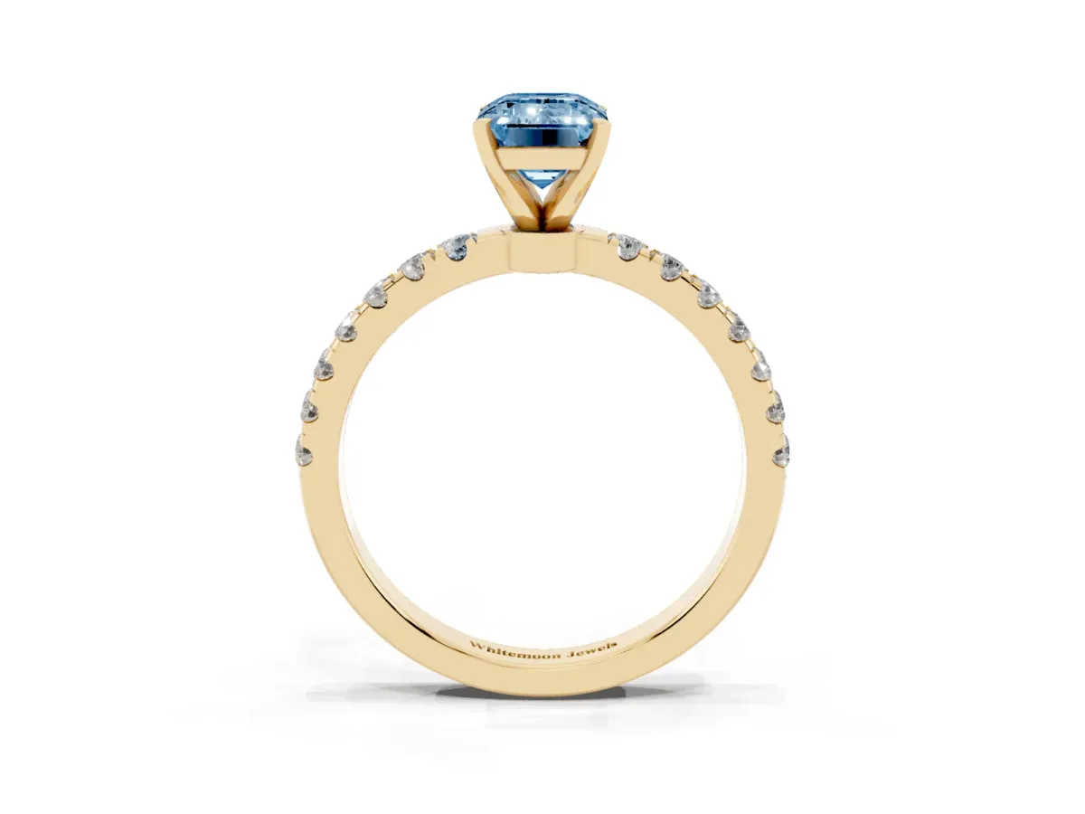 Fancy Blue Emerald Cut Diamond Solitaire Ring with Pavé Accents and Four-Prong Setting Yellow gold